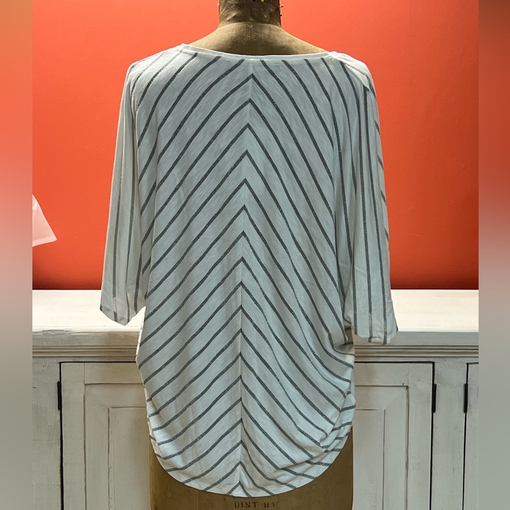 White House, Black Market Tee. Very comfortable. White with silver strips.